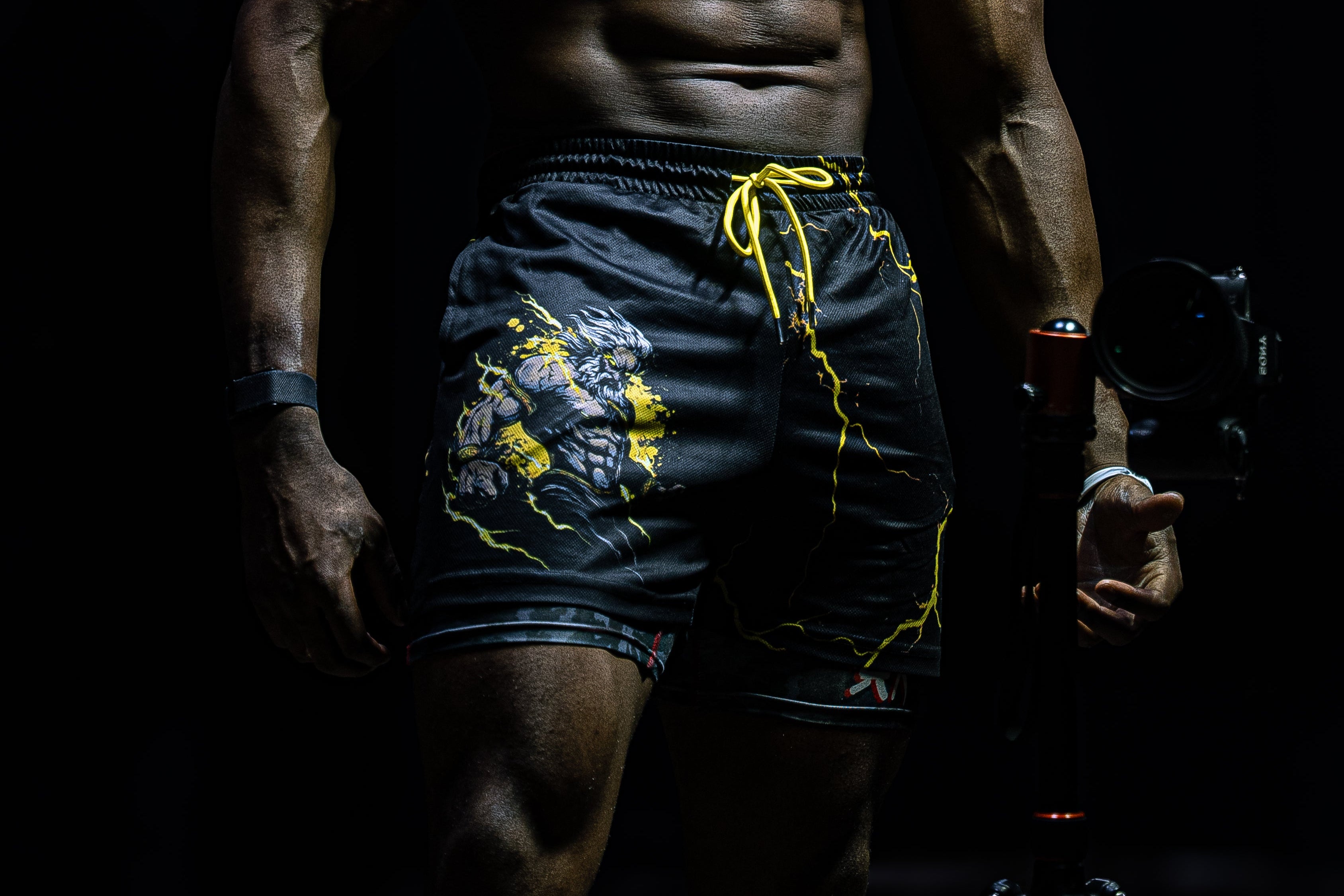 Atlas Lifting Co King of Olympus shorts worn by athlete — lightweight gym shorts