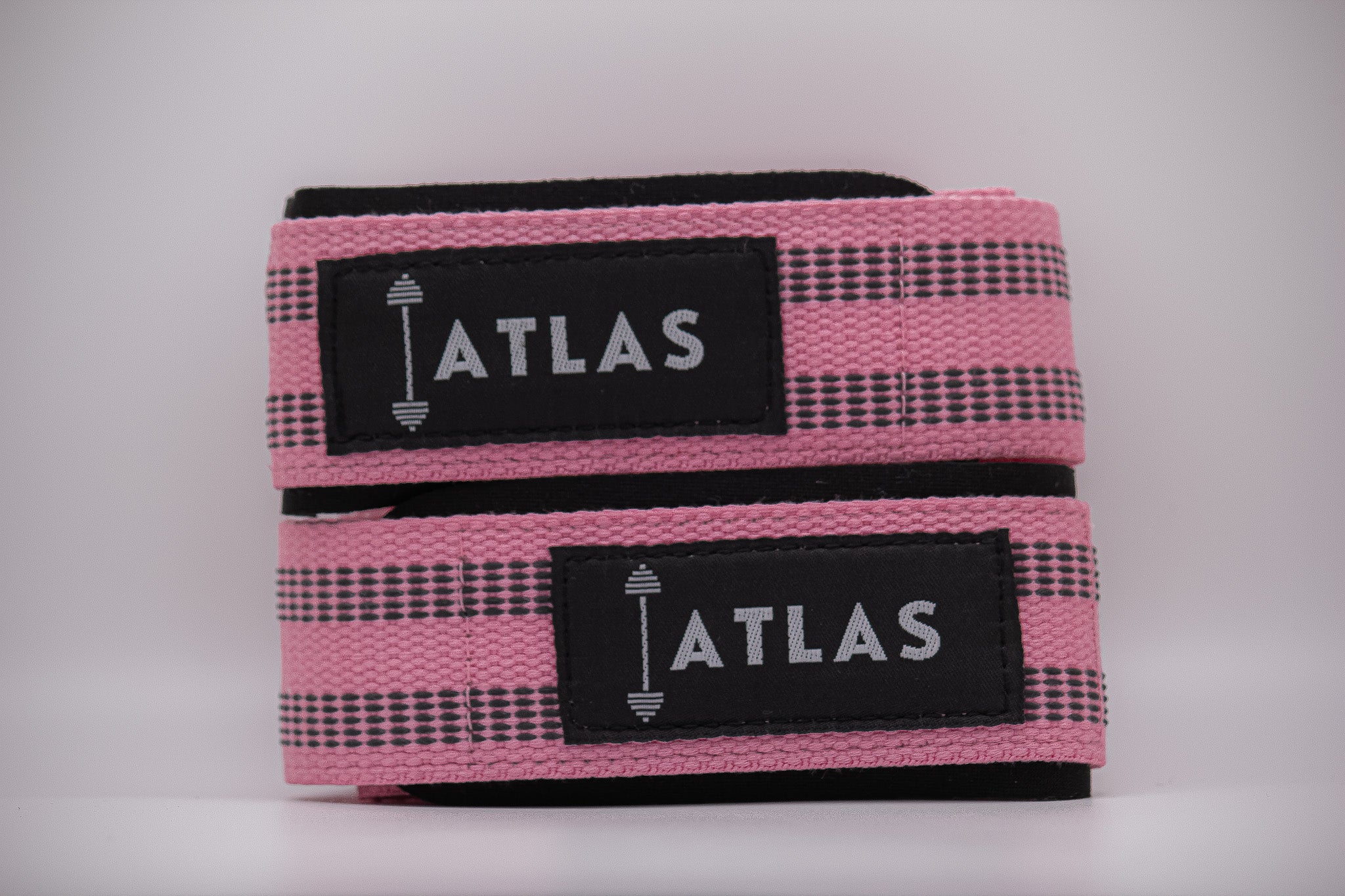 Weightlifting straps used for deadlifts, shrugs, pull-ups, and other pulling exercises. Weightlifting straps help maintain grip strength while performing heavy exercises and build forearm strength.